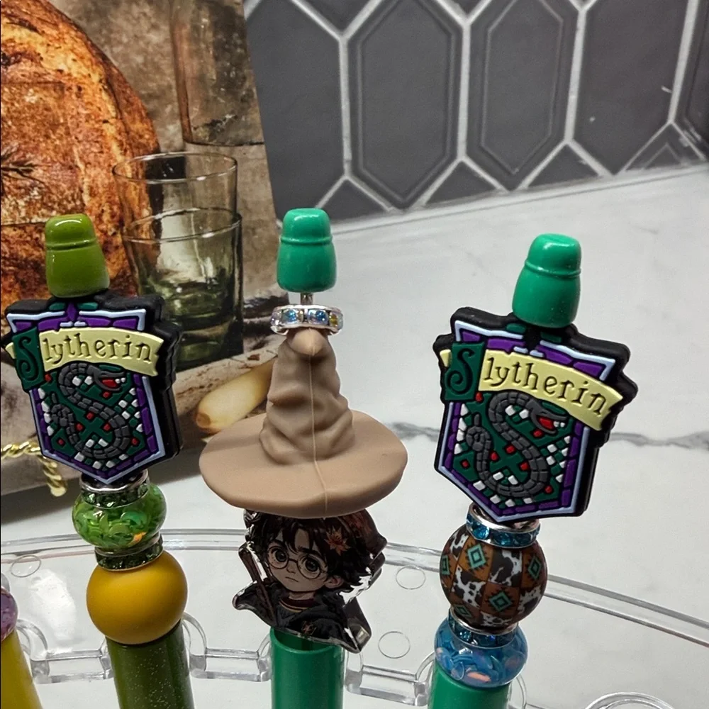 Harry Potter and Slytherin Themed Pens with Charms.